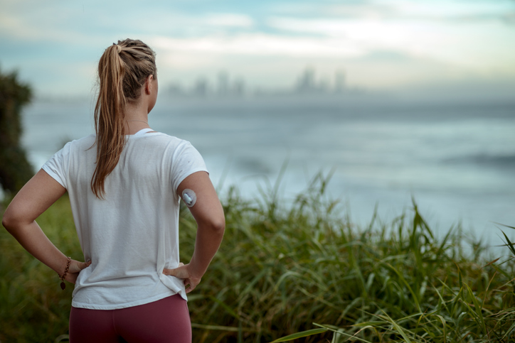 Diabetes woman ready for morning run along the coast