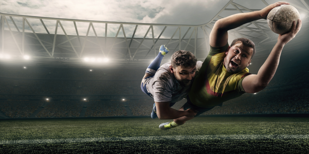 Two,Male,Rugby,Players,Fight,For,The,Ball,In,Flight