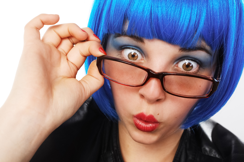 Girl,With,Blue,Wig,And,Glasses,Looking,Astonished