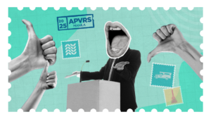 speaker at the podium with thumbs up and thumbs down